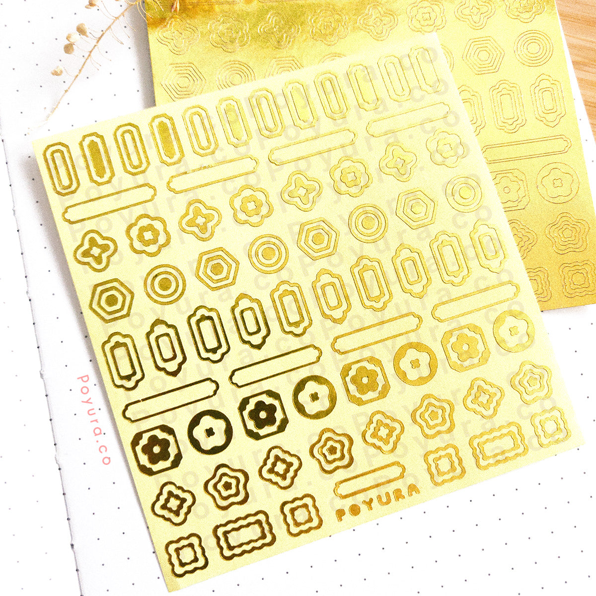 Borderless sticker with Asian circle and rectangle cutouts in gold foil