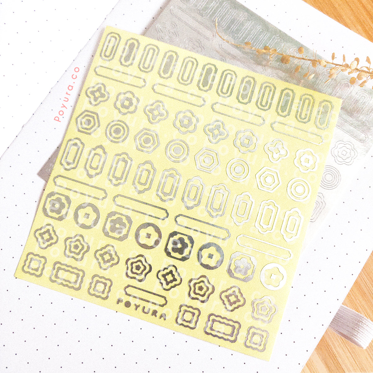 Borderless sticker with Asian circle and rectangle cutouts in silver foil