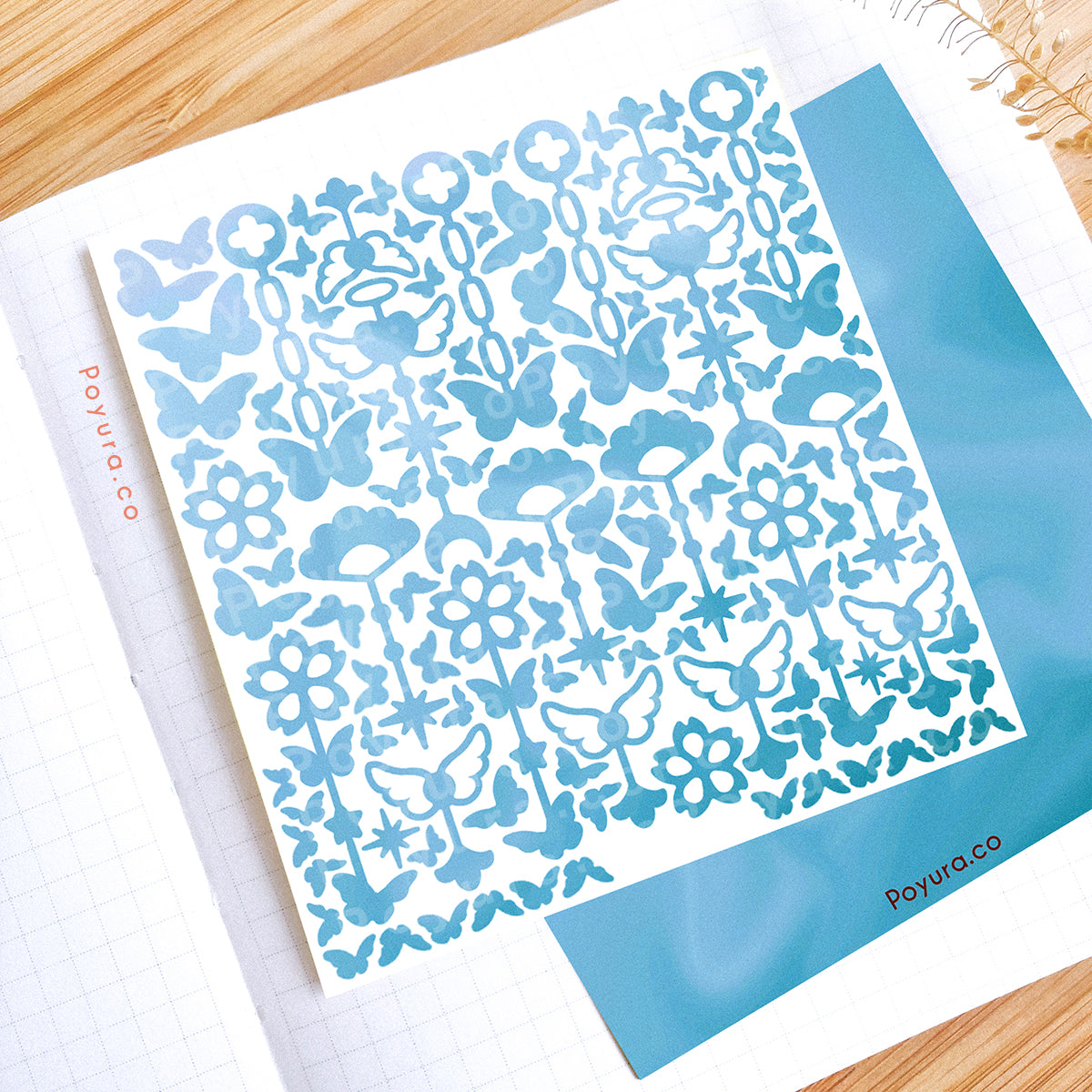 Borderless sticker with cute chain and butterfly cutouts in different blue tints