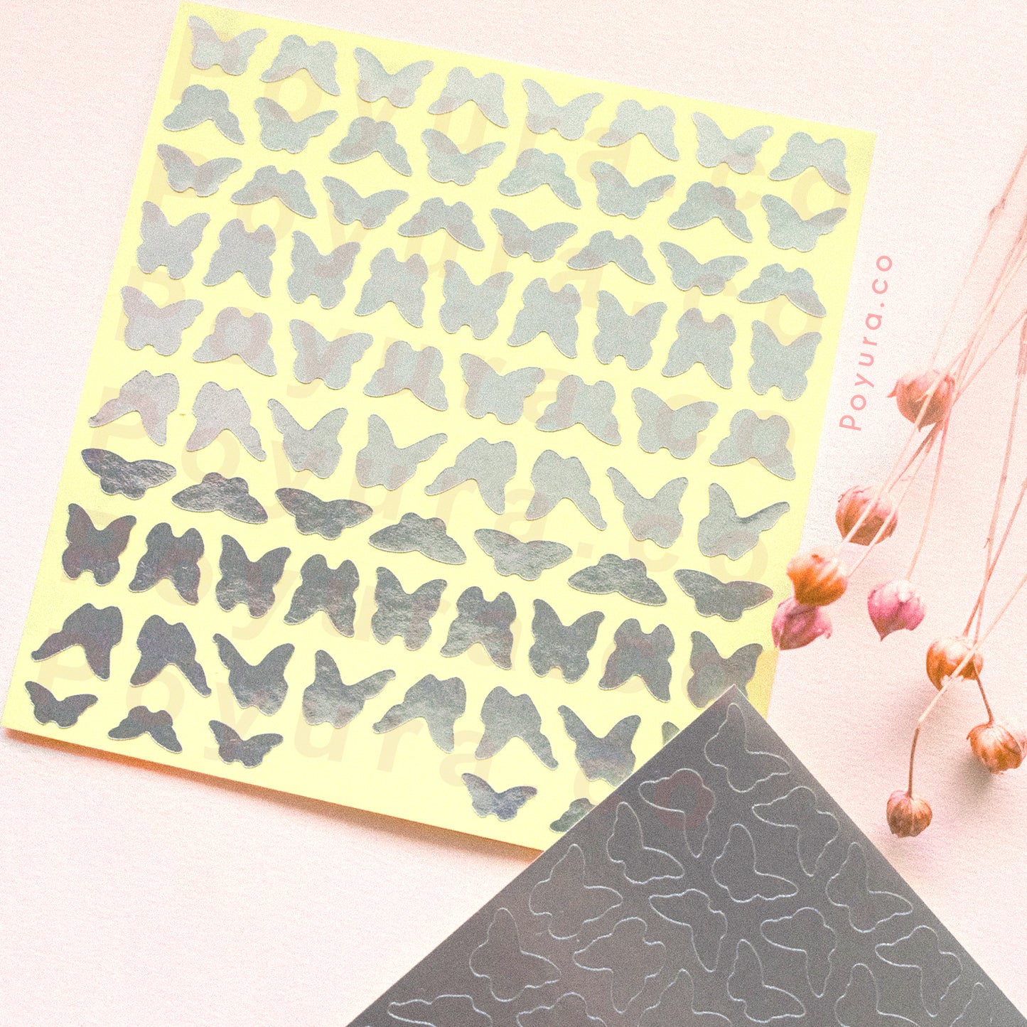 Borderless sticker with butterfly cutouts in silver foil