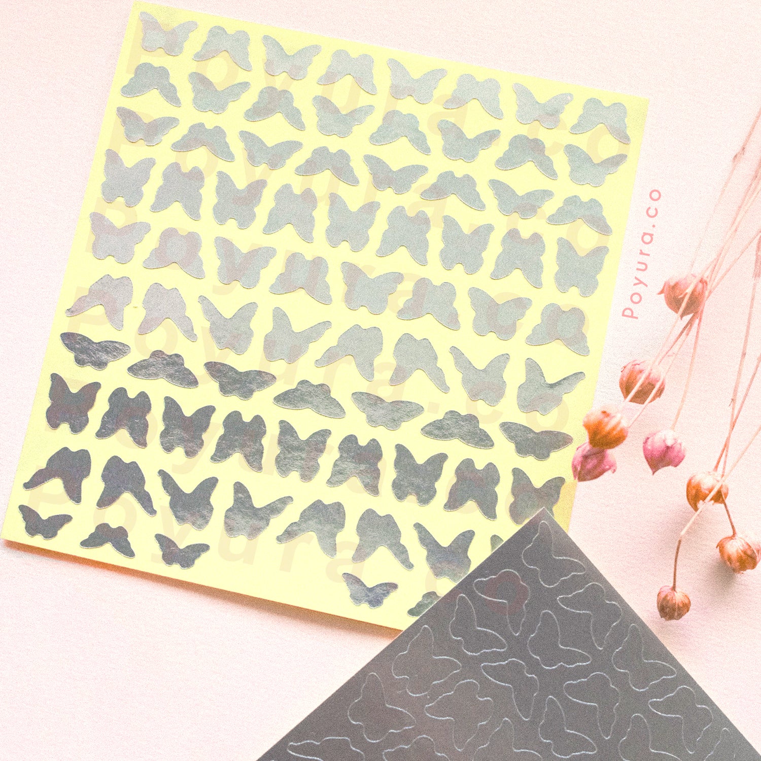 Borderless sticker with butterfly cutouts in silver foil