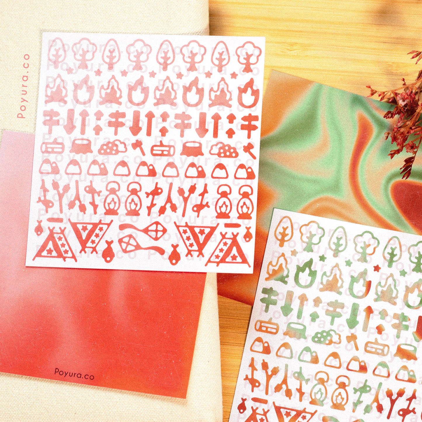 Borderless sticker with camping and tree cutouts in different red tints