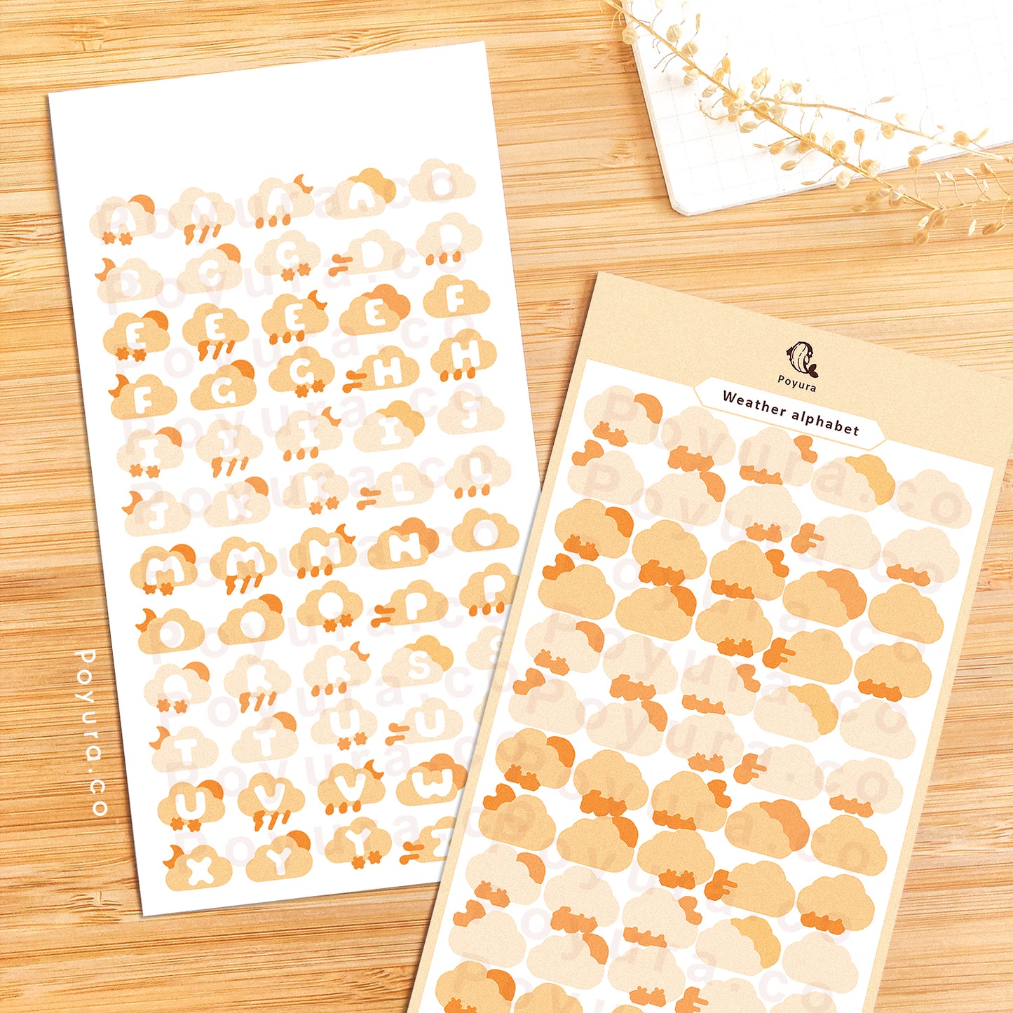 Sticker sheets of cute orange clouds with alphabet letter cutouts