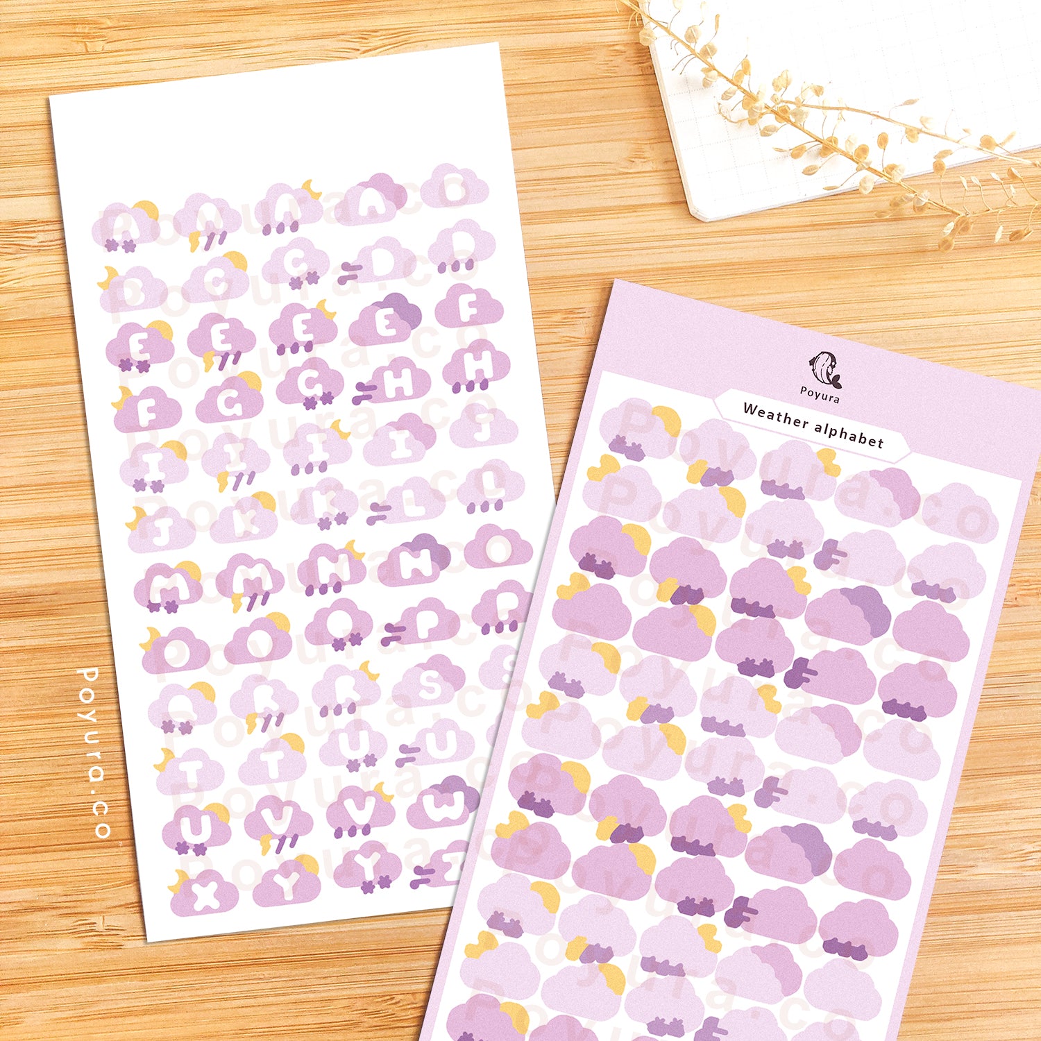 Sticker sheets of cute purple clouds with alphabet letter cutouts