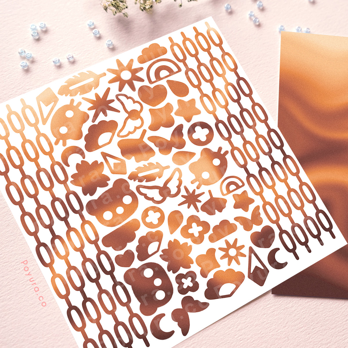 Borderless sticker with chain and shapes cutouts in different brown tints