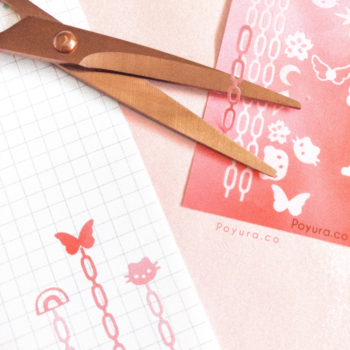 Borderless sticker with chain and shape cutouts in different red tints