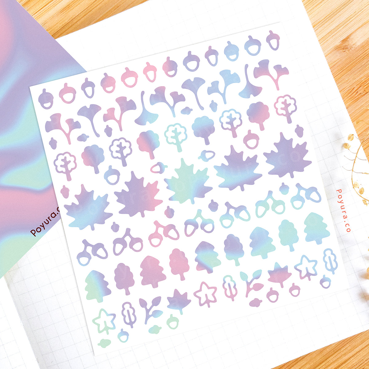 Borderless sticker with leaf and acorn cutouts in different purple and blue tints