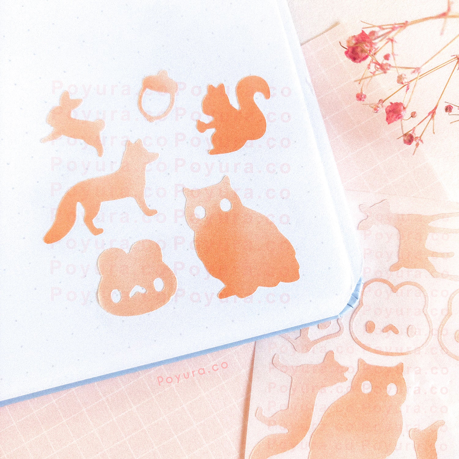 Borderless sticker with bunnies, foxes, and other forest animals cutouts in different orange tints