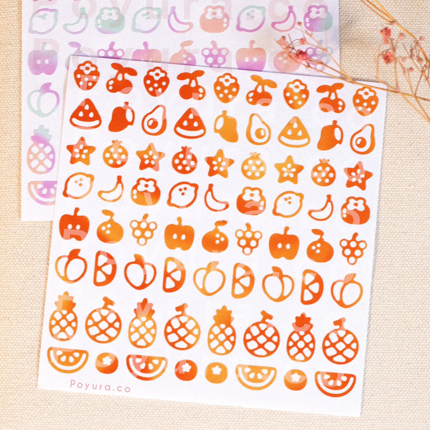 Borderless sticker with fruit cutouts in different orange and red tints