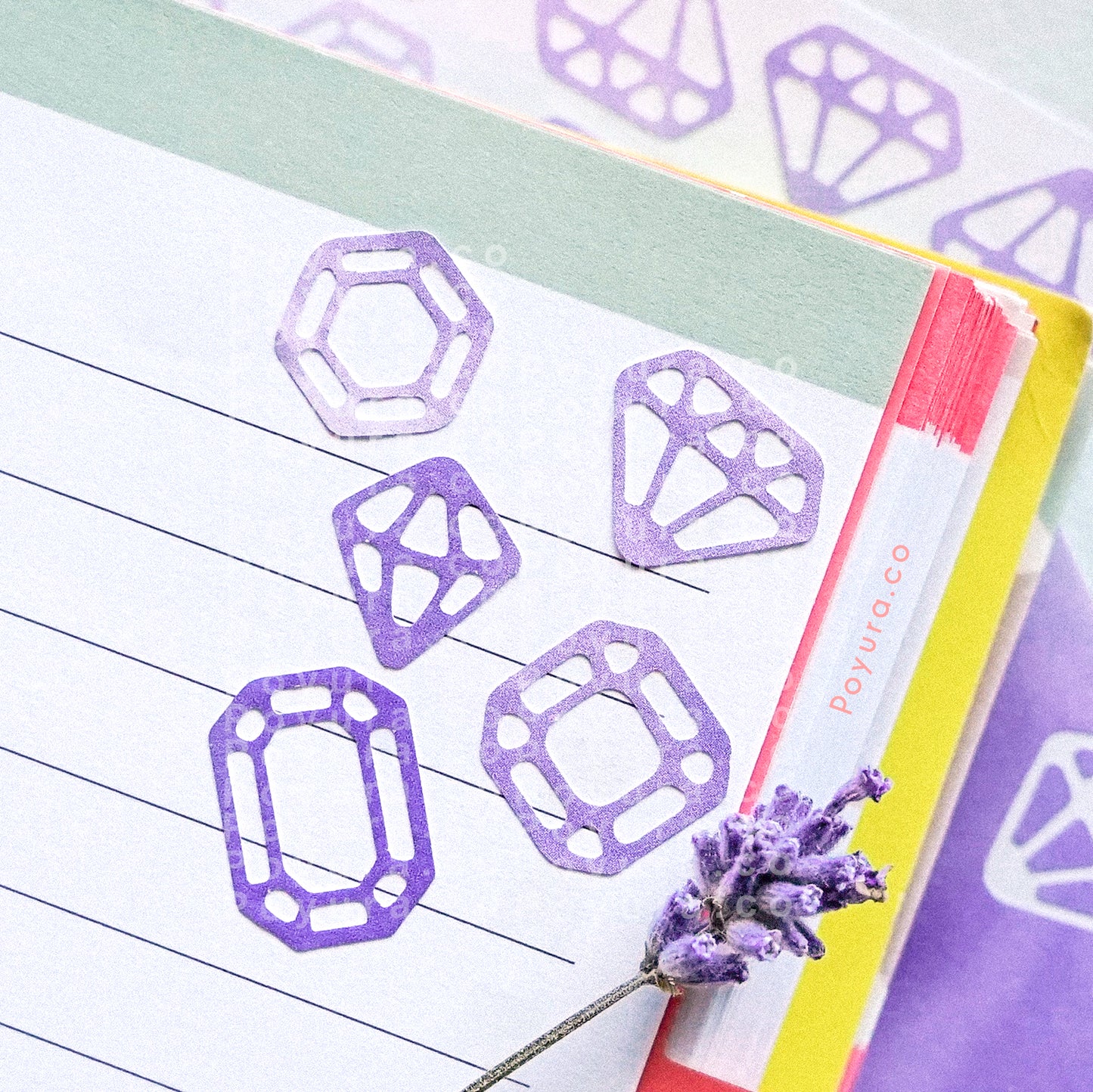 Borderless sticker with gemstone and crystal cutouts in purple tints