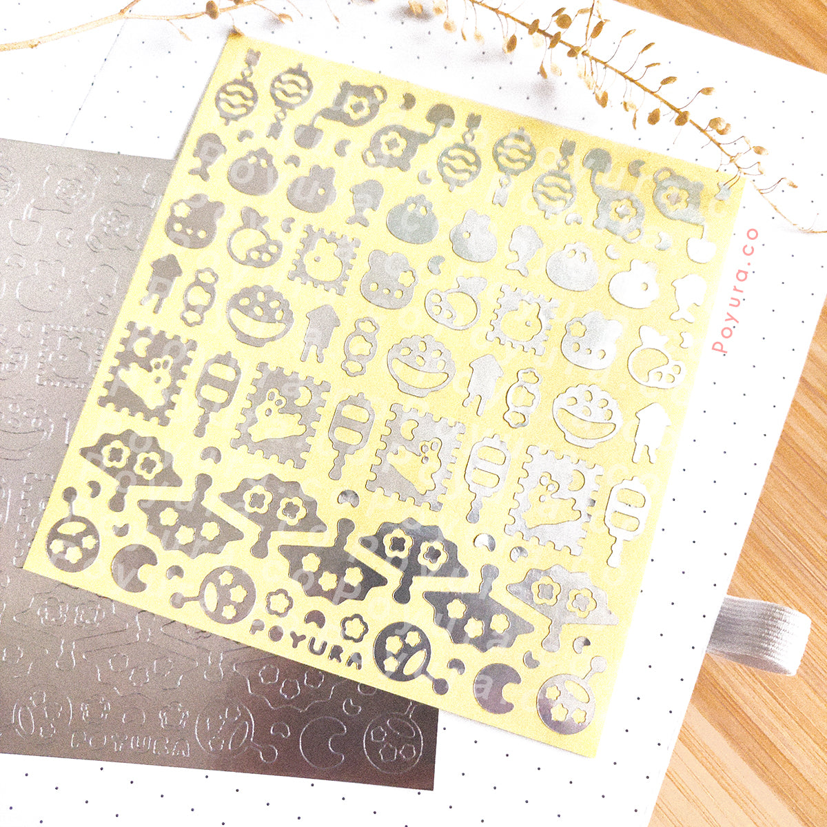 Borderless filler sticker with Lunar New Year cutouts in silver foil