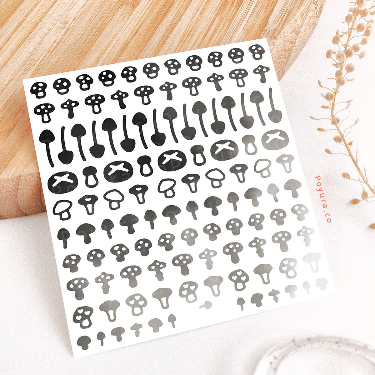 Borderless sticker with mushroom cutouts in different grey tints