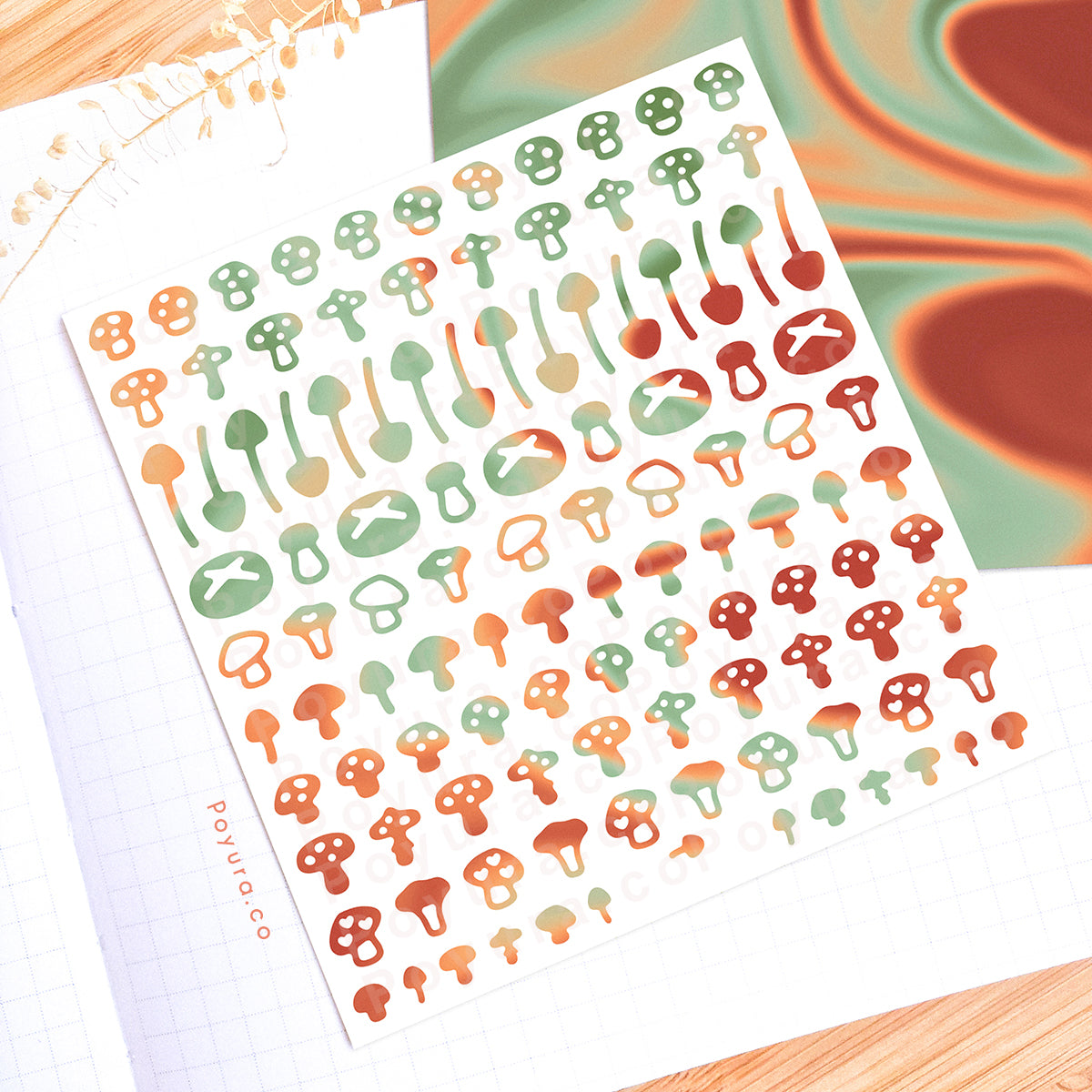 Borderless sticker with mushroom cutouts in different red and green tints