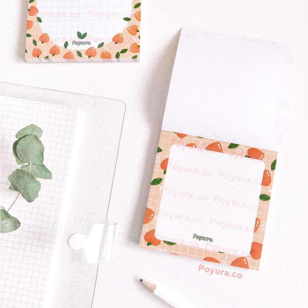 Squared memo notepad with peaches and leaves around the border