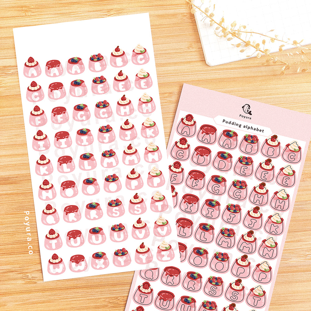 Sticker sheet of pink puddings with alphabet letter cutout in the center.