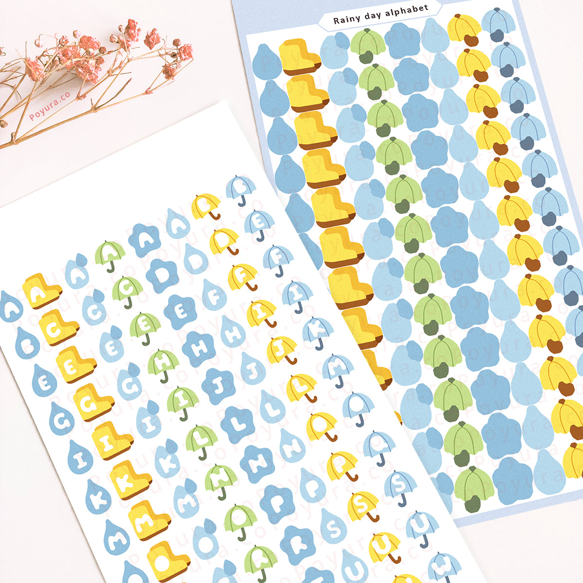 Sticker sheet of cute rain boots and umbrella with alphabet letter cutouts