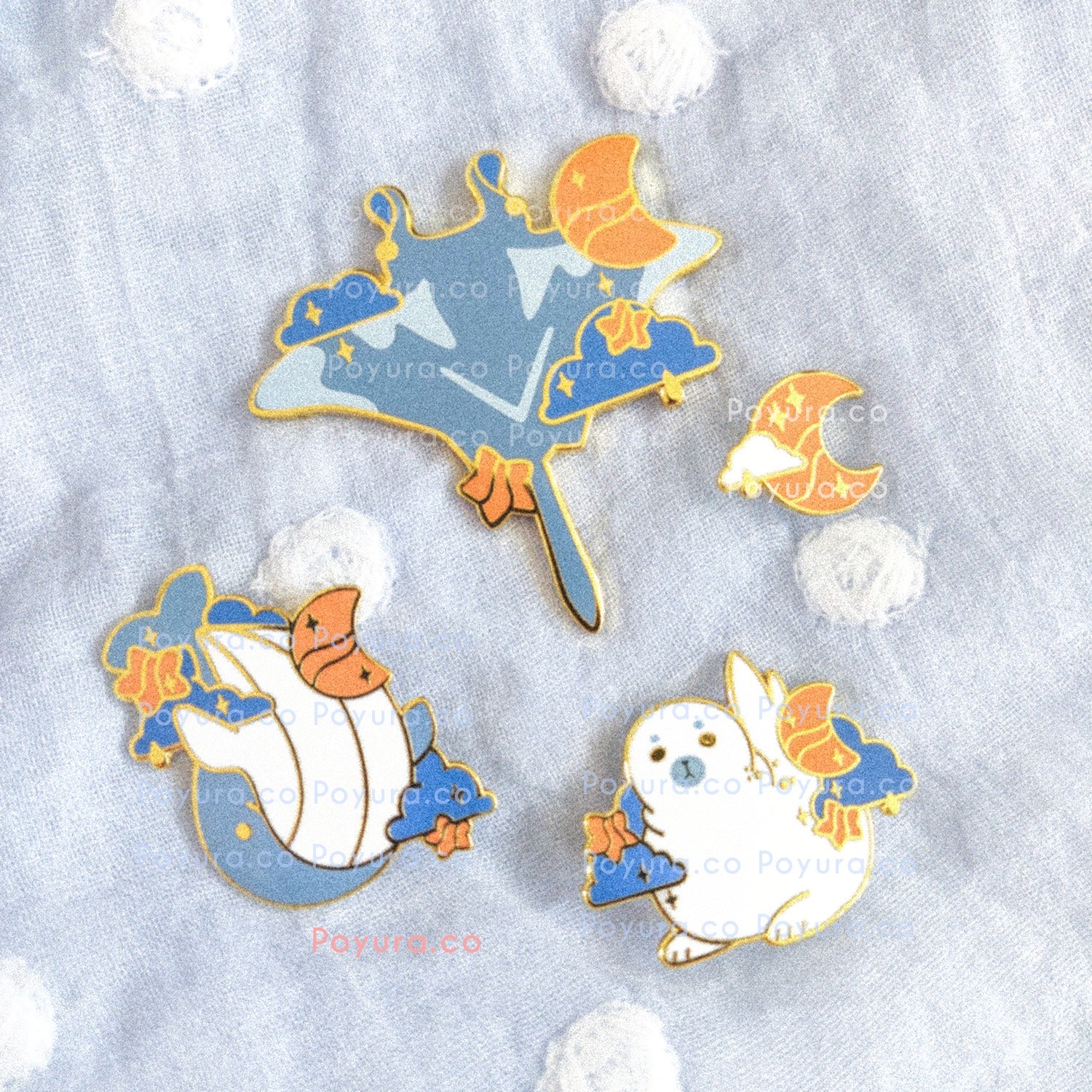 Four matching enamel pin bundle with whale, seal, manta ray, and a moon