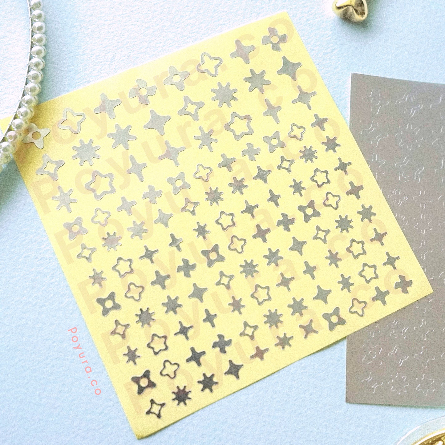 Borderless sticker with sparkle cutouts in silver foil