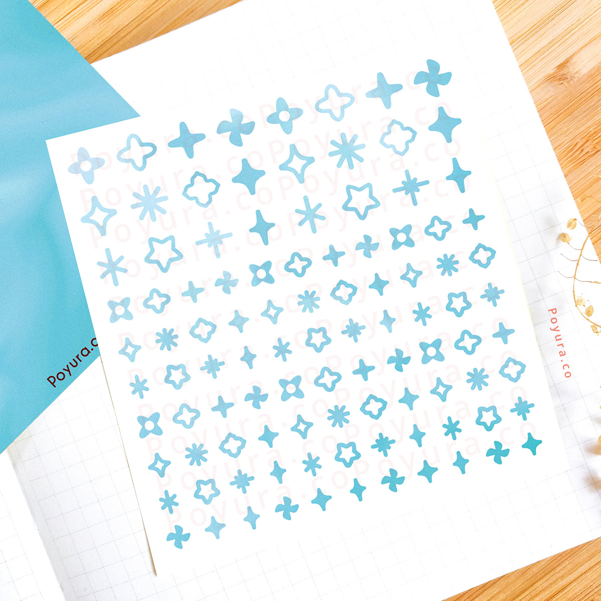 Borderless sticker with sparkle cutouts in different blue tints