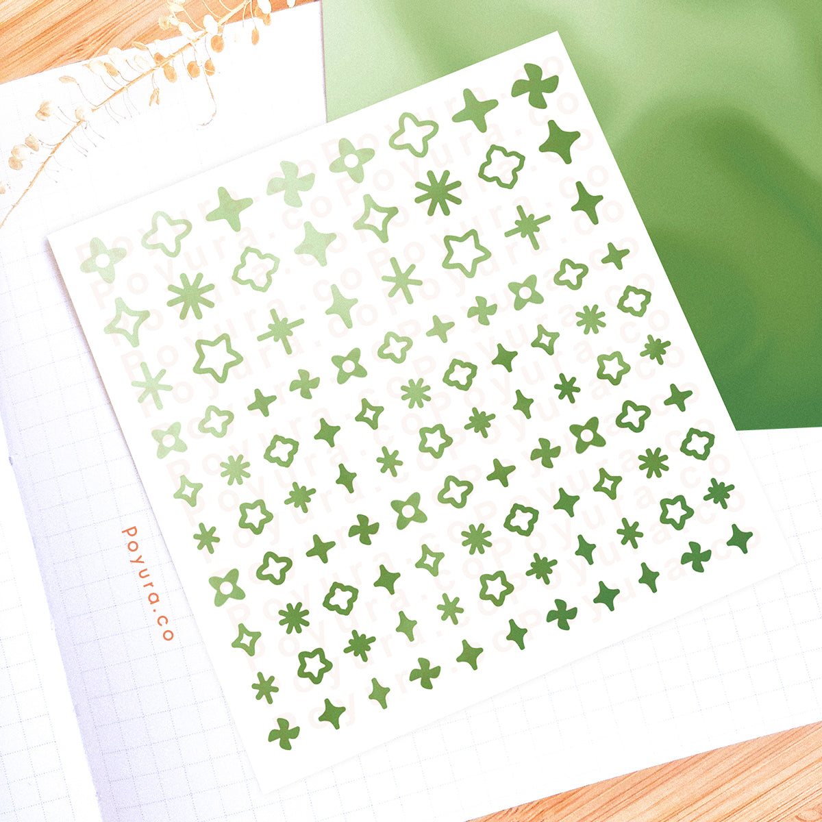 Borderless sticker with sparkle cutouts in different green tints