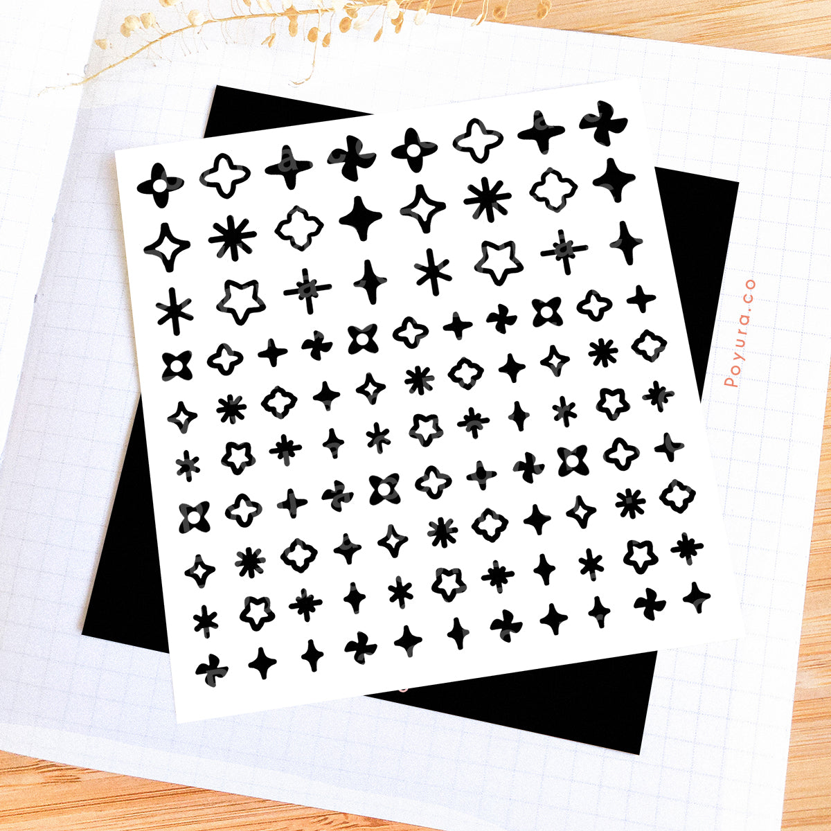 Borderless sticker with sparkle cutouts in black