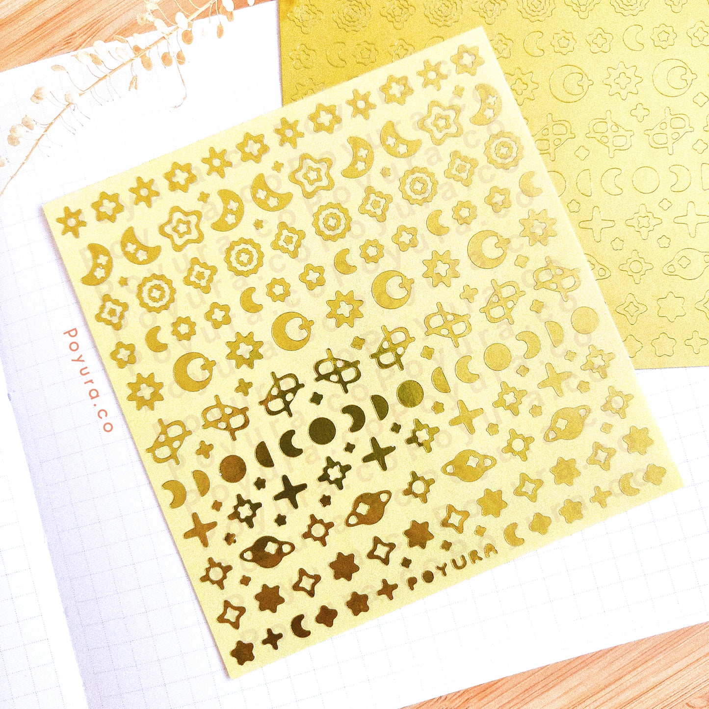 Borderless sticker with the sun and moon cutouts in gold foil