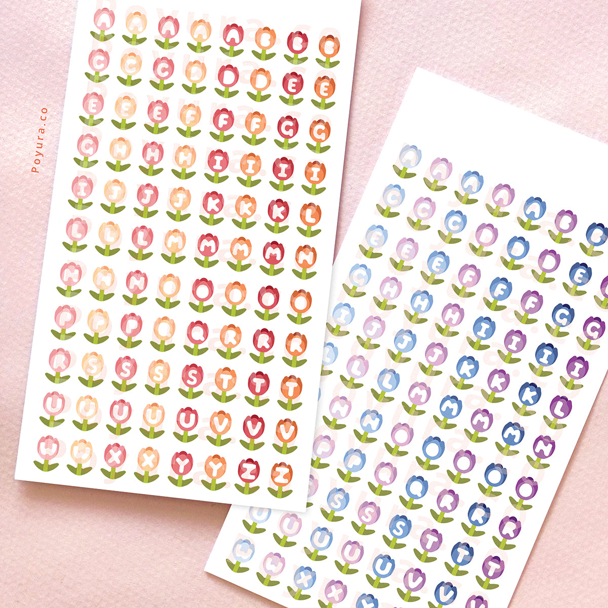 Two sticker sheets of warm-colored and cool-colored tulips with alphabet letter cutouts in the center.