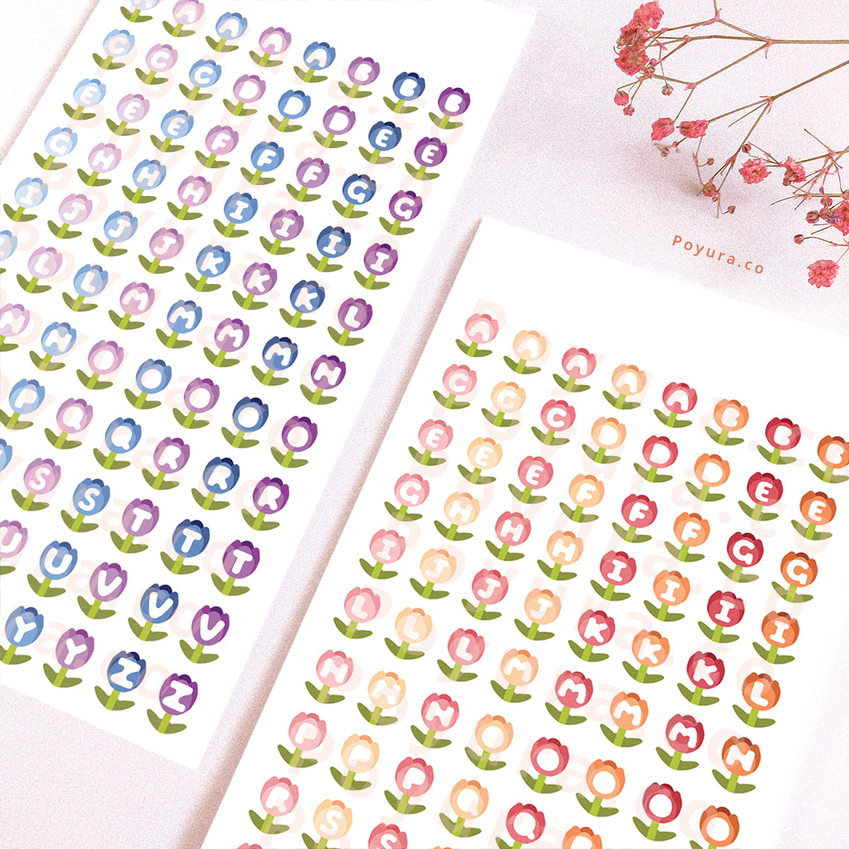 Two sticker sheets of warm-colored and cool-colored tulips with alphabet letter cutouts in the center.