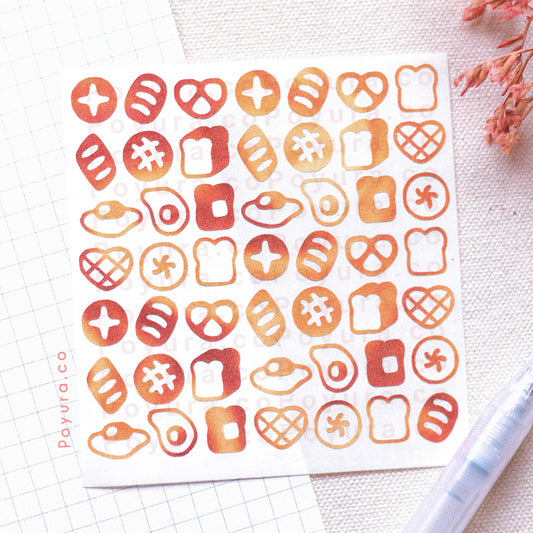 Borderless sticker with bread and egg cutouts in different red and orange tints