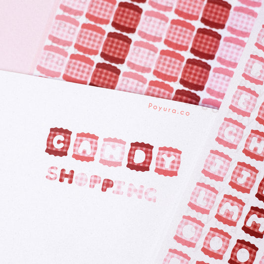 Sticker sheet of cute red sweets with a plaid pattern and letter cutouts