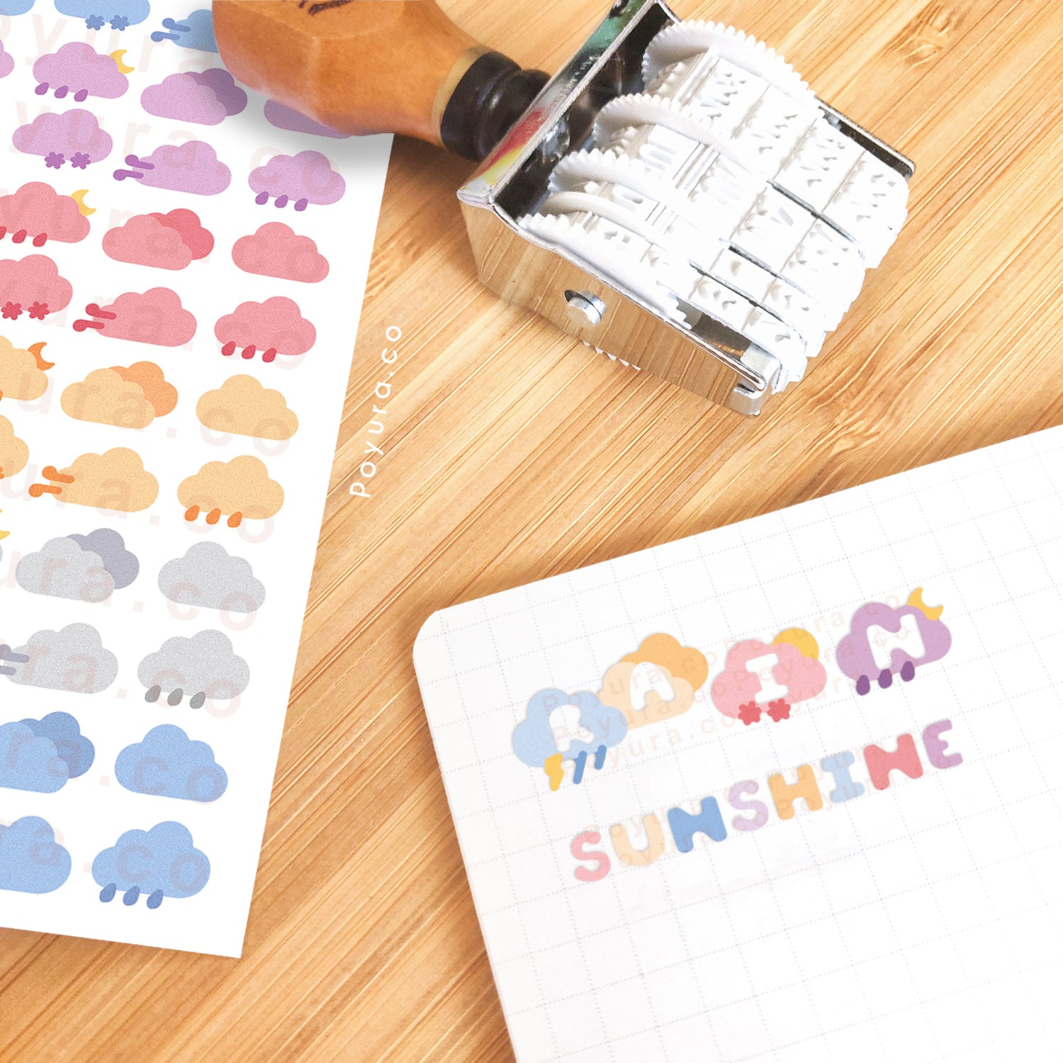 Stickers of cute clouds with alphabet letter on a journal