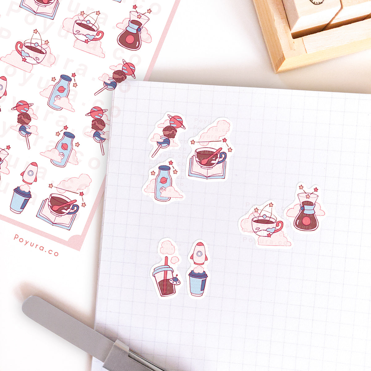 Journal spread decorated with coffee and space stickers.
