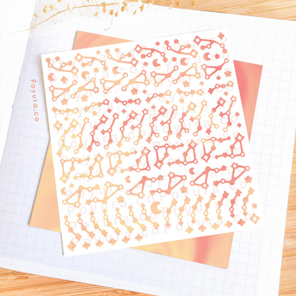 Borderless sticker with constellation star cutouts in different orange and pink tints