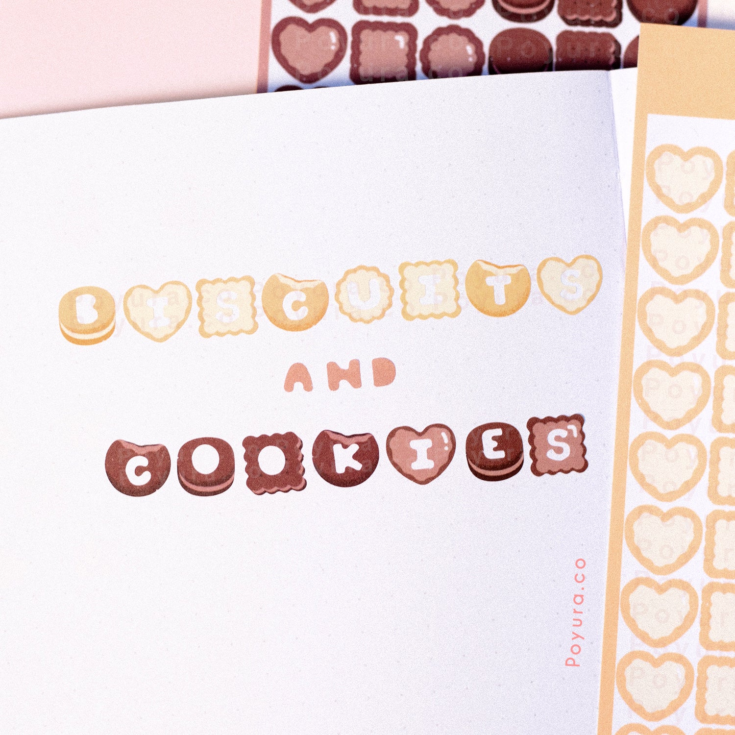 Sticker of cute biscuits and cookies with alphabet letter cutouts in a journal spread