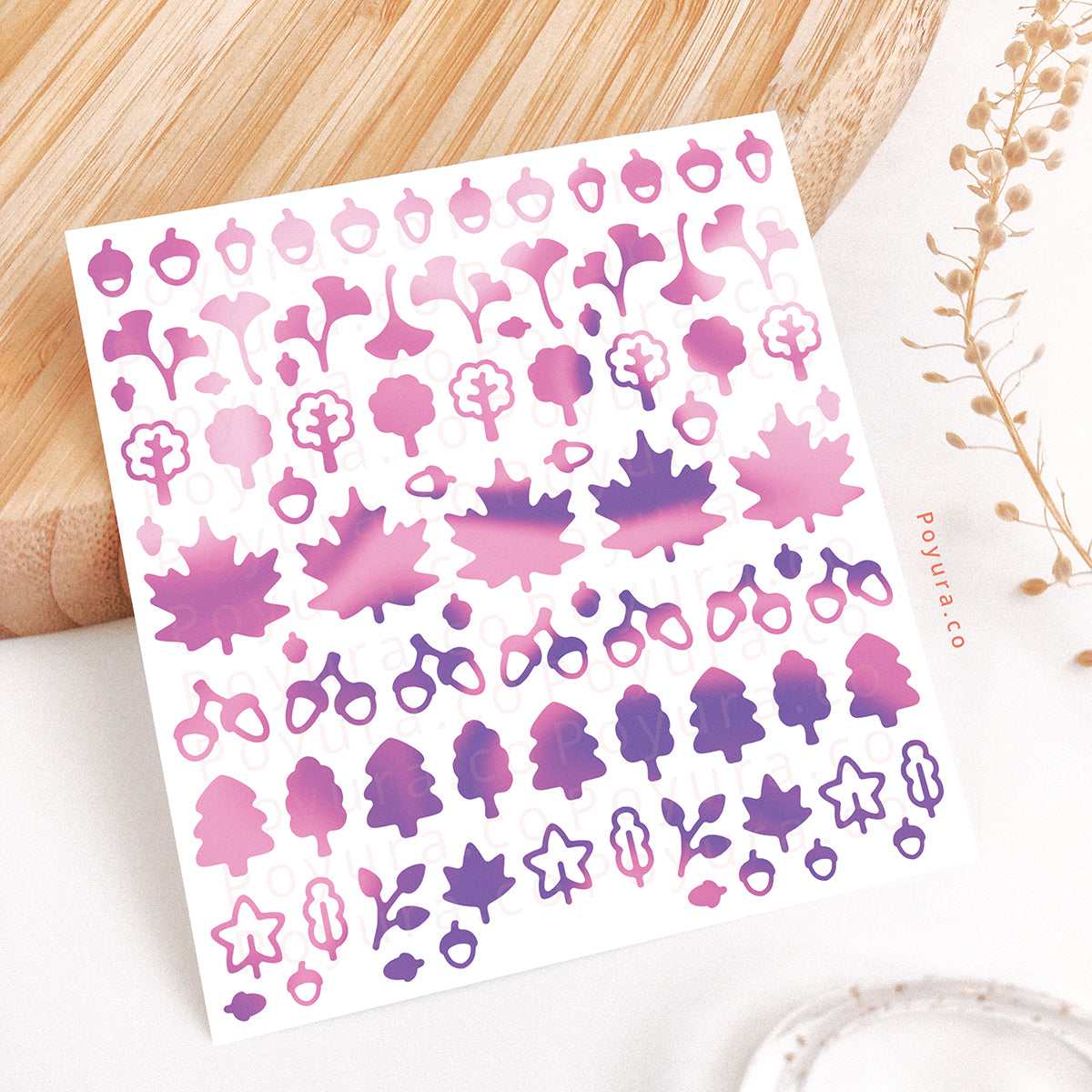 Borderless sticker with leaf and acorn cutouts in different purple tints