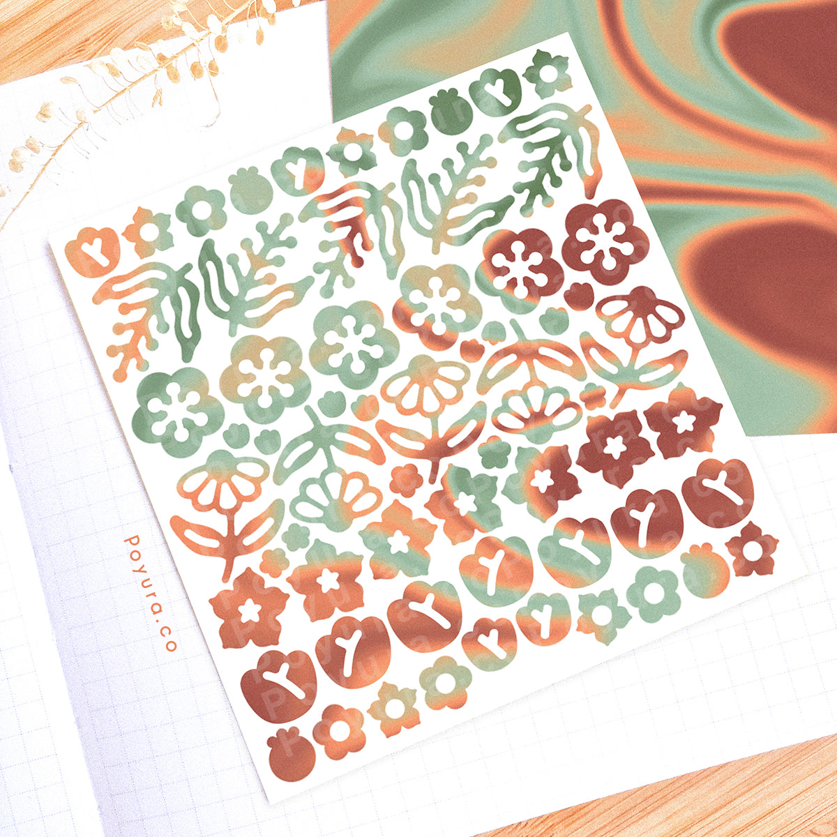 Borderless sticker with cute leave and flower cutouts in different orange, red, and green tints