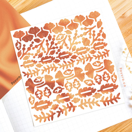 Borderless sticker with cute leave cutouts in different orange and red tints