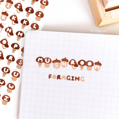 Sticker sheet of cute fall mushrooms with alphabet letter cutouts
