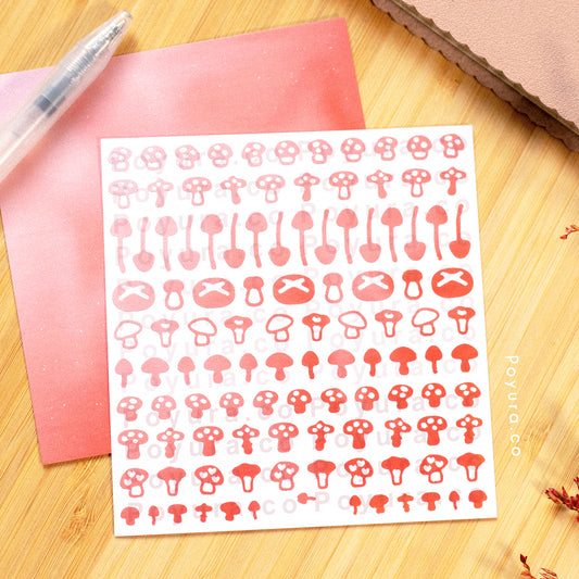 Borderless sticker with mushroom cutouts in different red tints