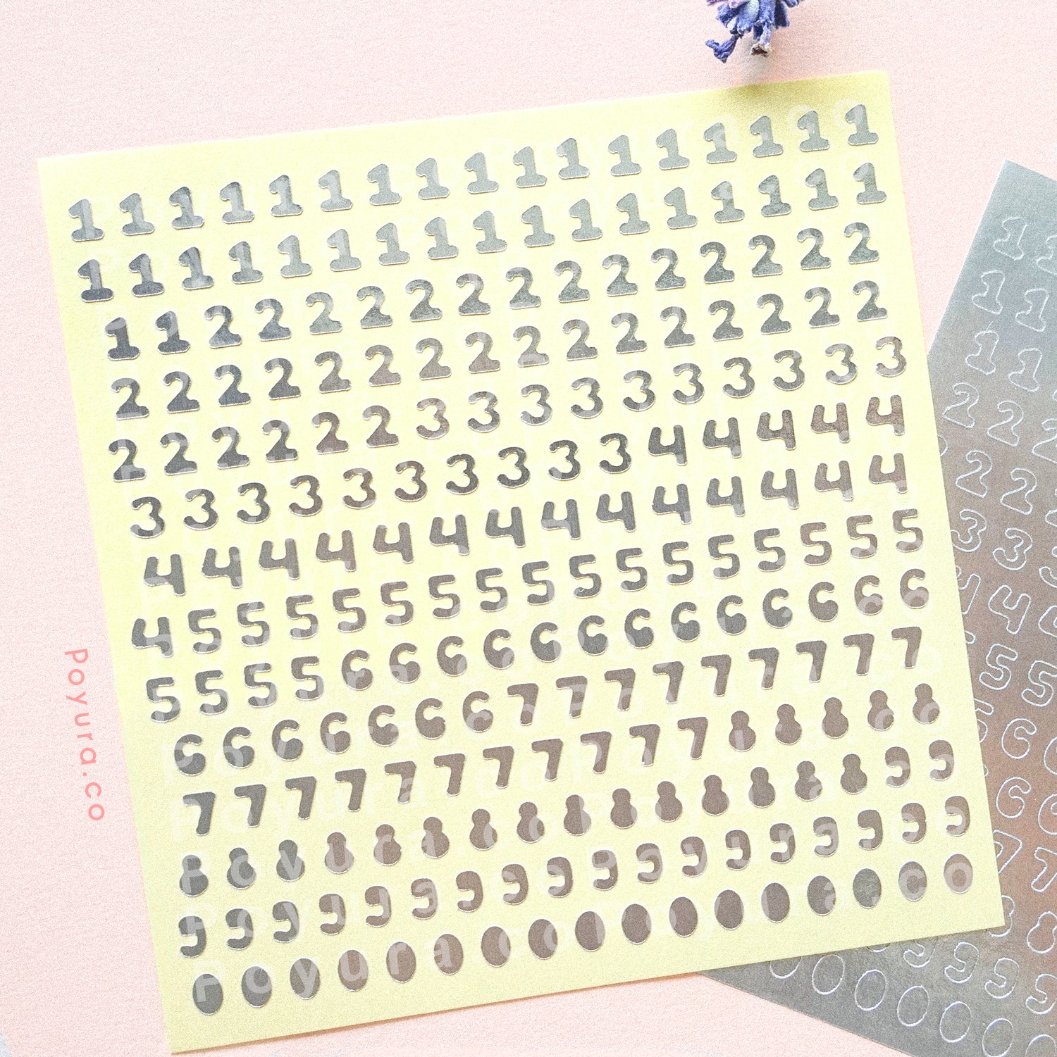 Borderless sticker with number cutouts in silver foil