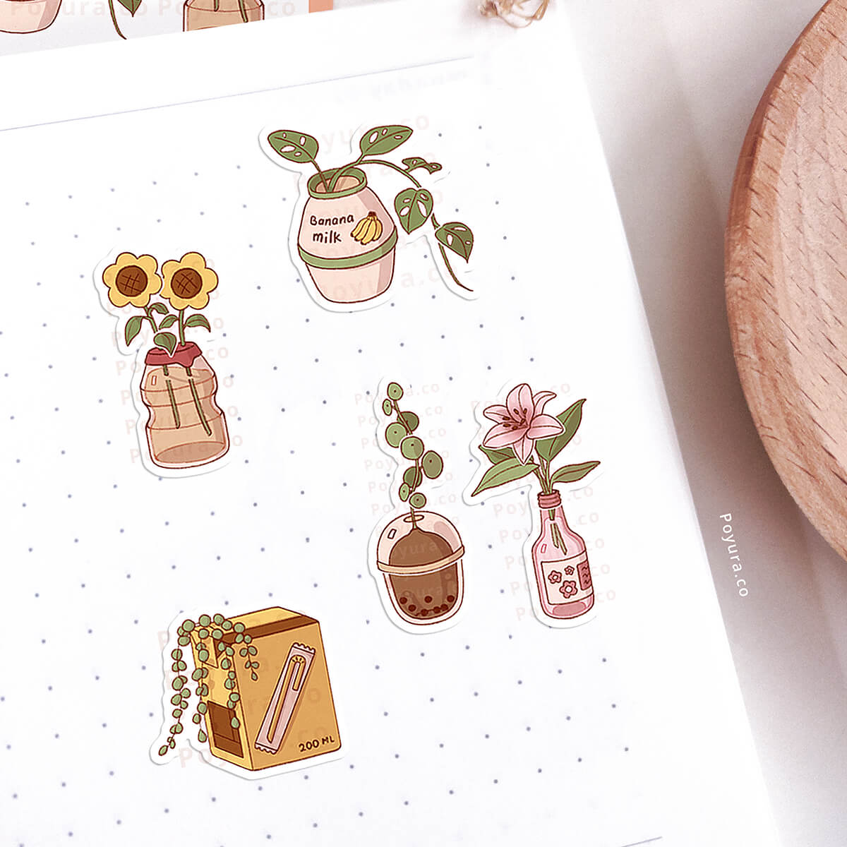Set of cute plants in Asian drinks stickers on a white notebook.