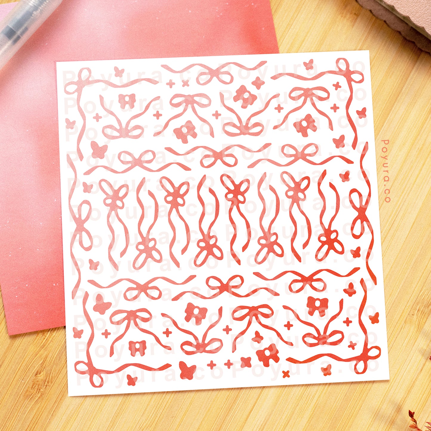 Borderless sticker with cute ribbon and sparkle cutouts in different red tints