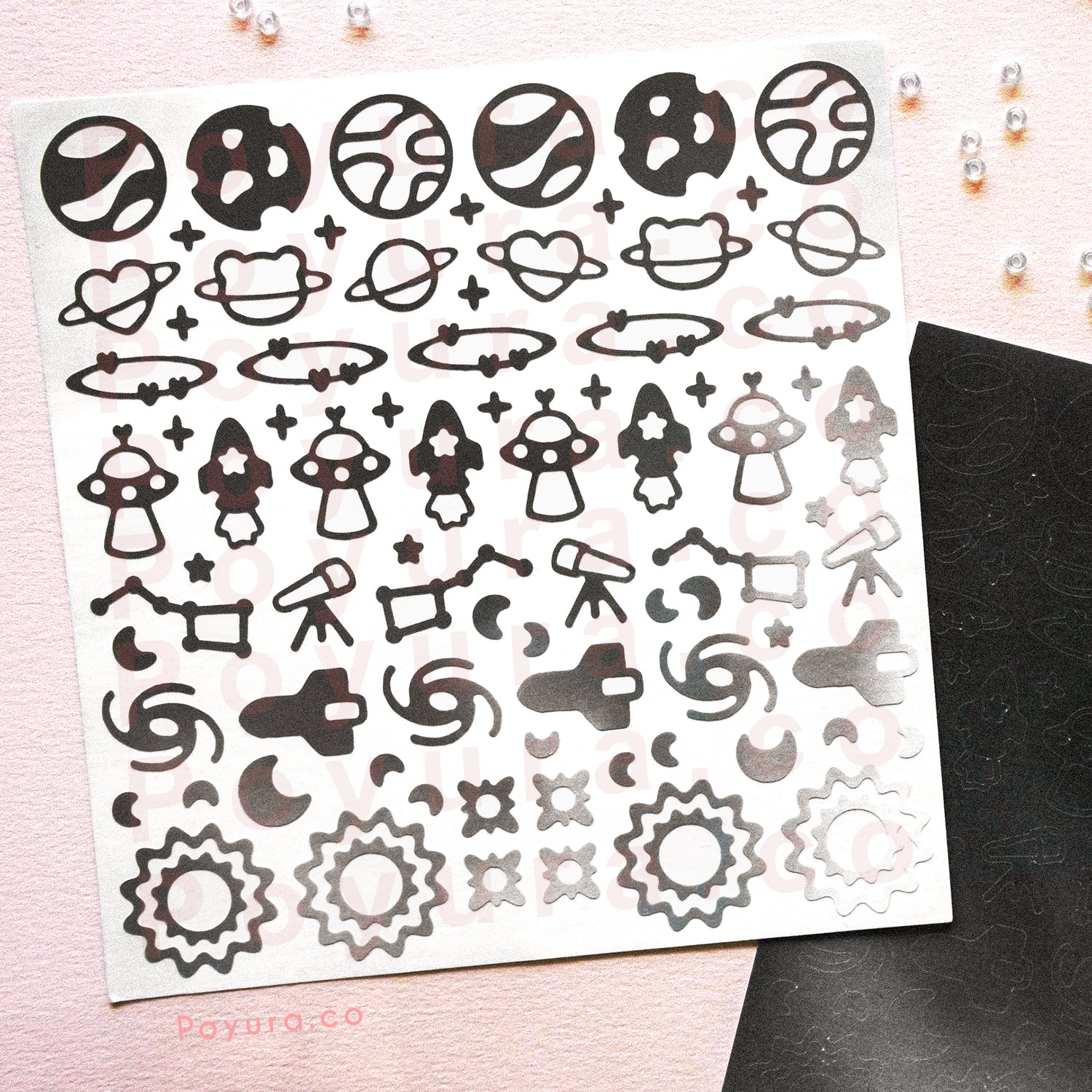 Borderless sticker with space planets cutouts in different grey tints