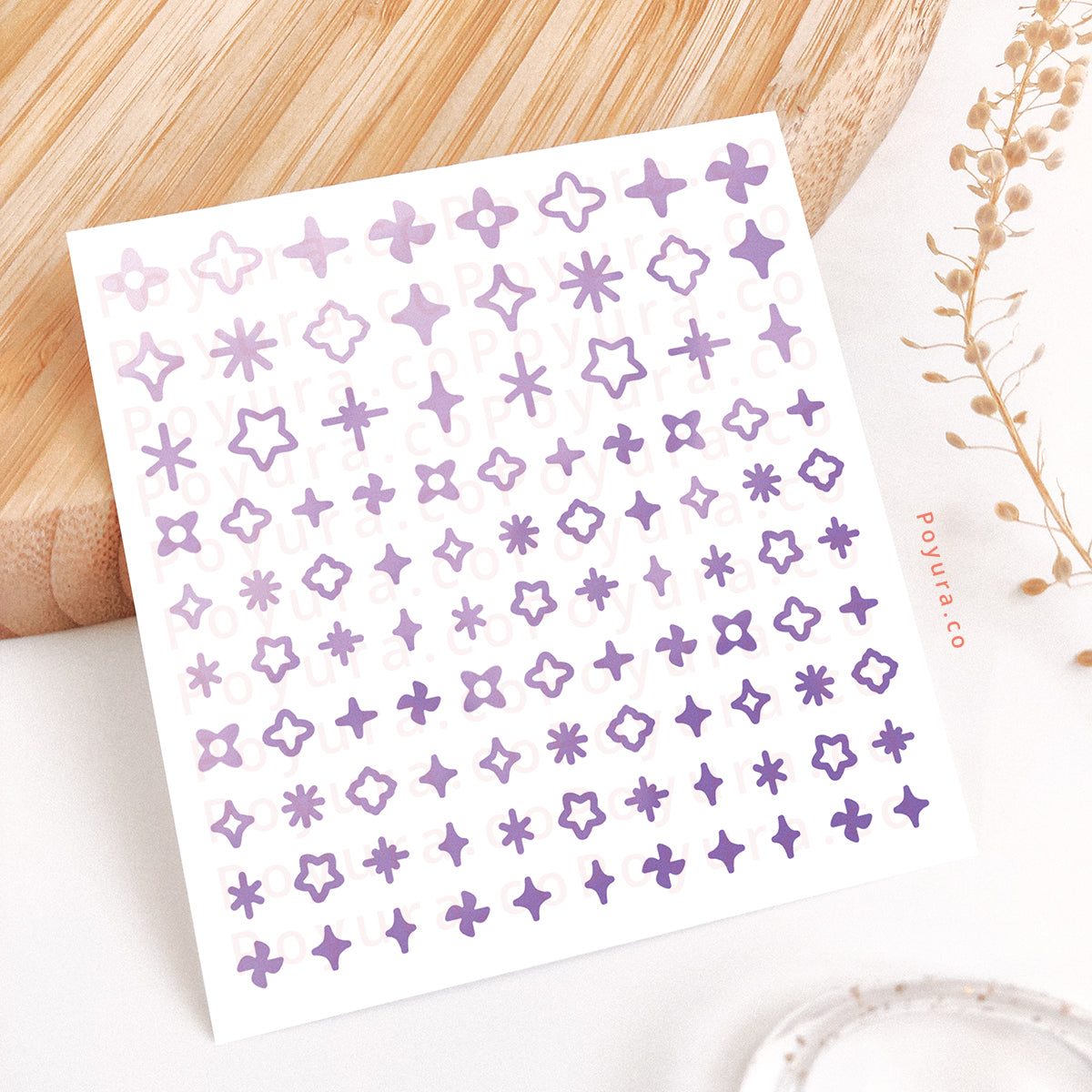 Borderless sticker with sparkle cutouts in different purple tints