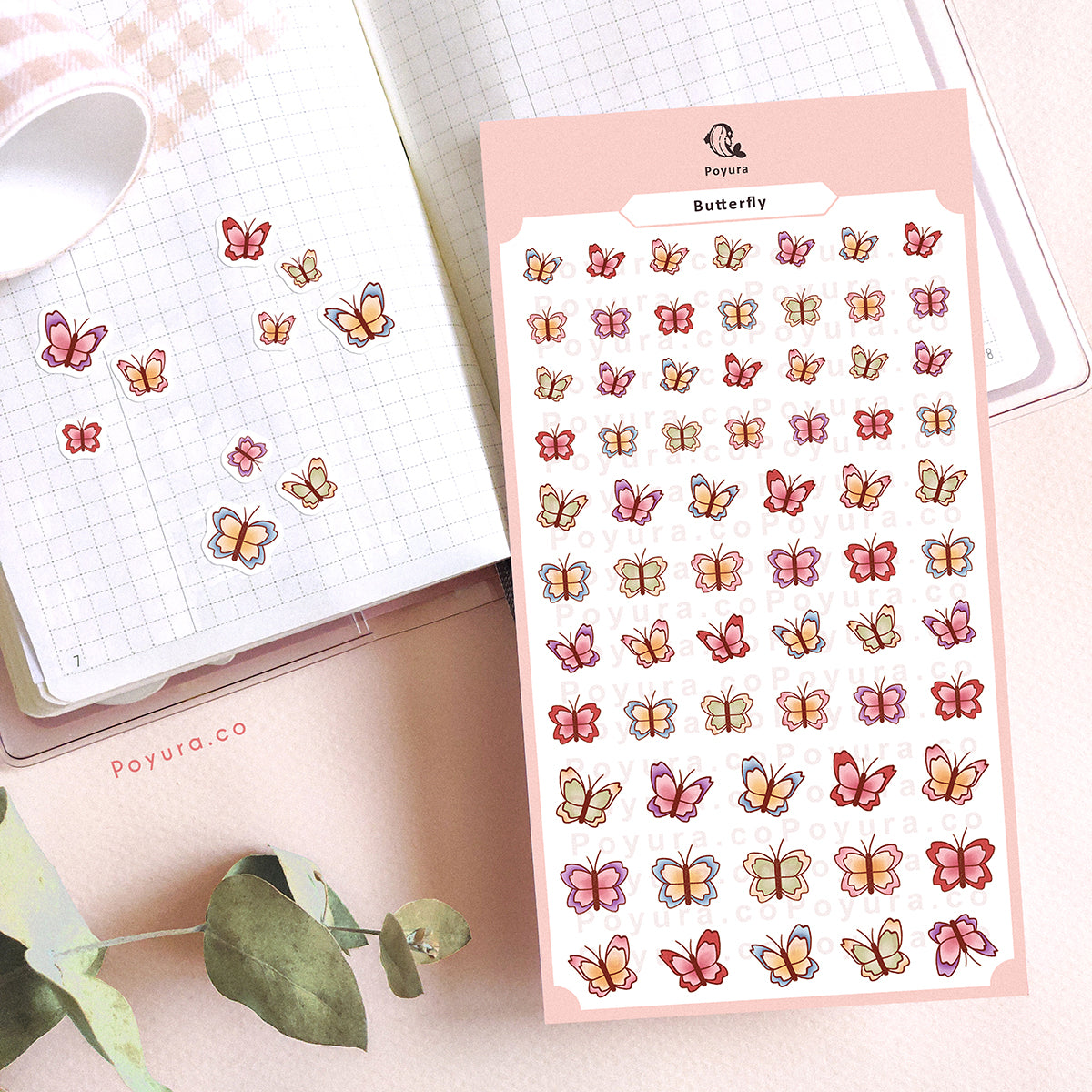 Stickers of cute spring butterfly in different colors on a journal