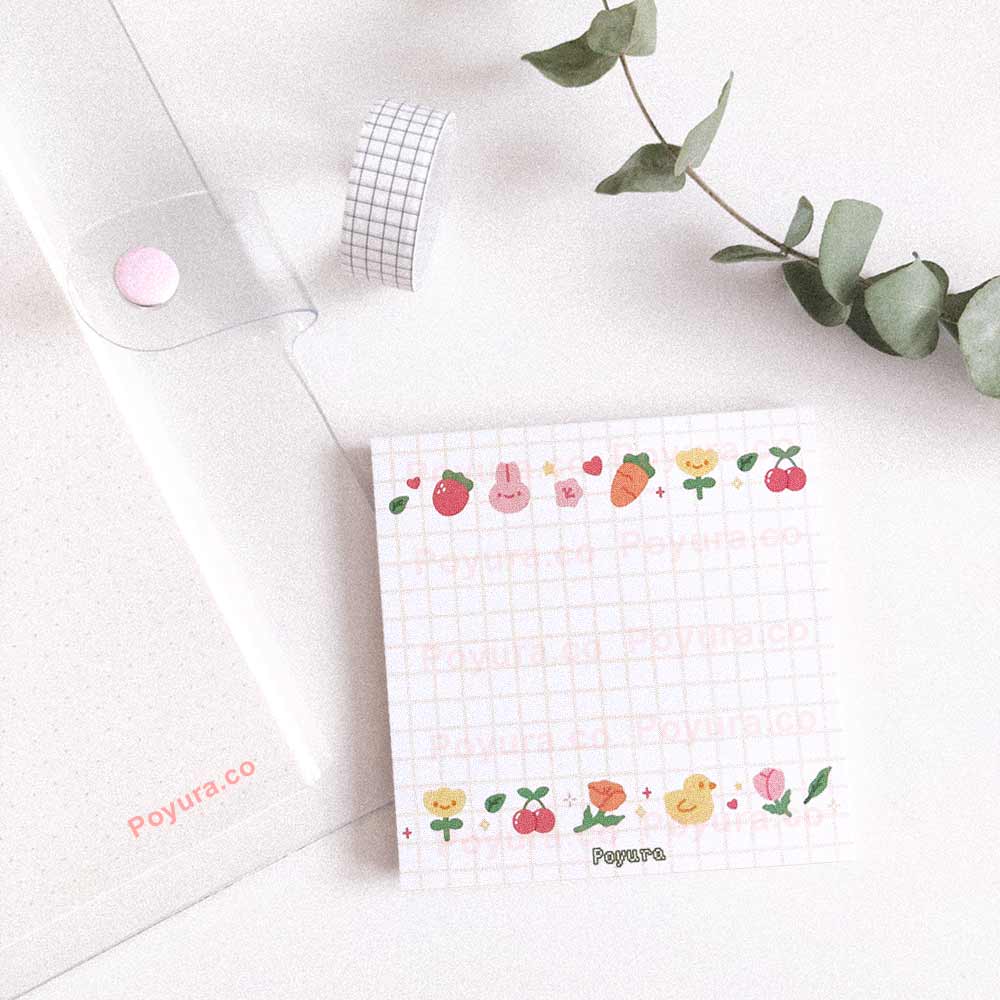 White square memo notepad with grid and cute garden friends doodles