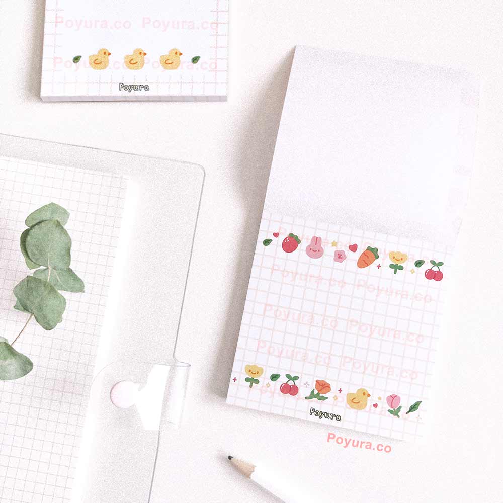 White square memo notepad with grid and cute garden friends doodles
