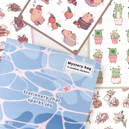 Mystery bag of random stickers with an ocean-patterned packaging.