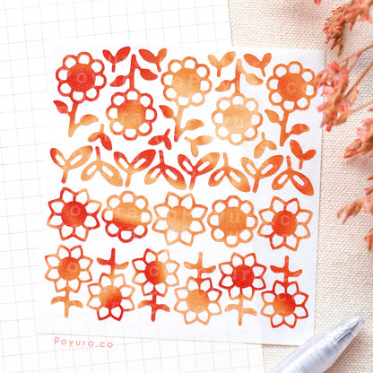 Borderless sticker with sunflower and leaves cutouts in different red and orange tints