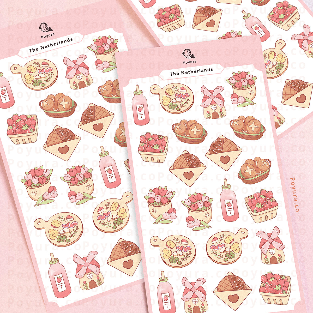 Three sticker sheets of typical Dutch things. There are windmills, tulips, bread, syrup waffles, strawberries, and cheese.